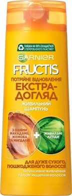 Шампунь Garnier Fructis Потрійне відновлення олія-догляд для сухого та пошкодженого волосся 400 мл